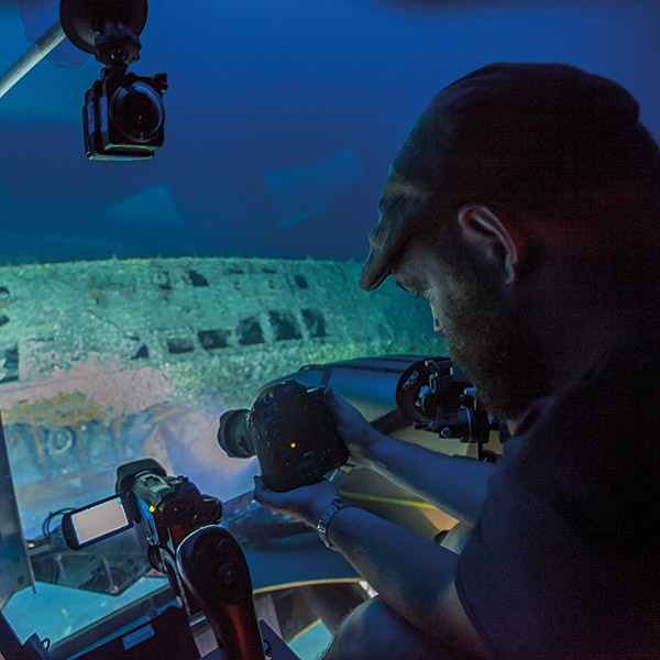 joe hoyt in a submersible taking photos of the wreck of u-576