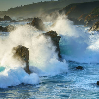 waves crashing near rocky shore