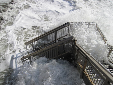 Big tides hitting on a stairwell