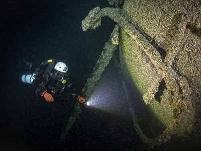 a diver near a wreck
