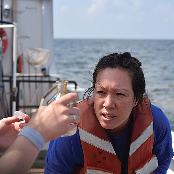 scientist examining water sample
