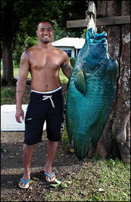 photos of fisherman with a caught fish
