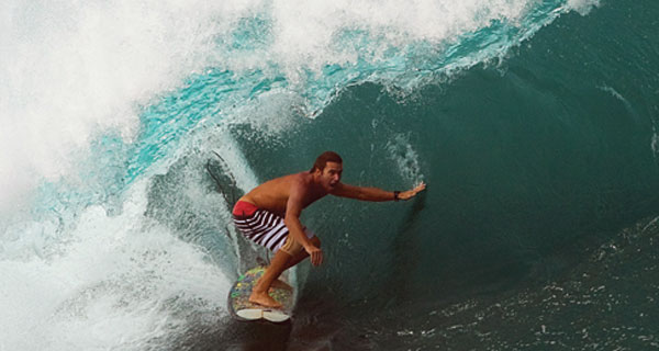 close up of guy surfing