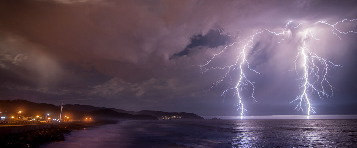 photo of lightning on a beach